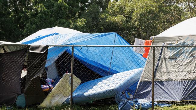 Tents in a fenced off area at Musgrave Park in South Brisbane which has seen an escalation of fighting and unsociable behaviour according to council complaints.