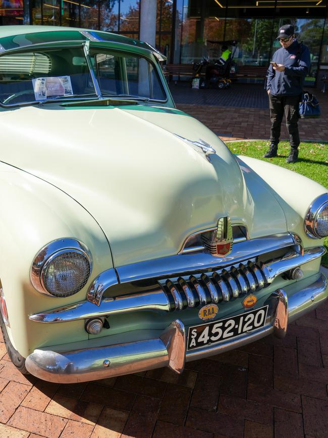 Members of the 48-FJ Holden Club polished some of their prized cars for locals to marvel at during Mr Loffler’s event. Picture: Salisbury Council