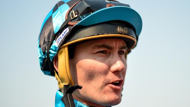 Jockey Michael Hellyer speaks to the media at Doomben Racecourse in Brisbane, Saturday, December 7, 2019. Picture: AAP Image/Albert Perez