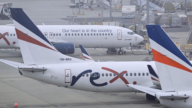 Rex Airlines Boeing 737 planes lay idle on the tarmac at Melbourne's Tullamarine Airport. Picture: William West/AFP