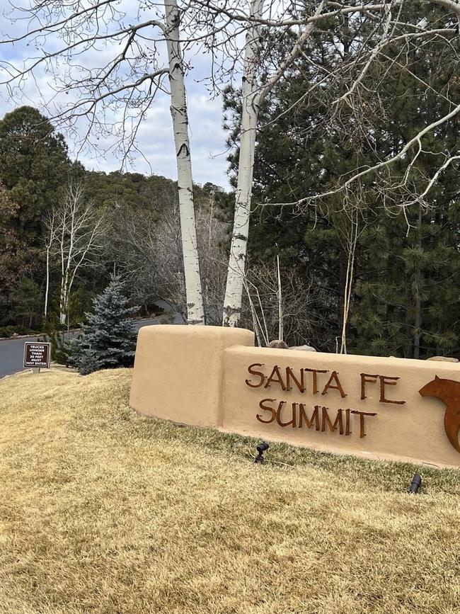 The entrance to the gated community where actor Gene Hackman, his wife Betsy Arakawa and their dog were found dead in their home. Picture: AP