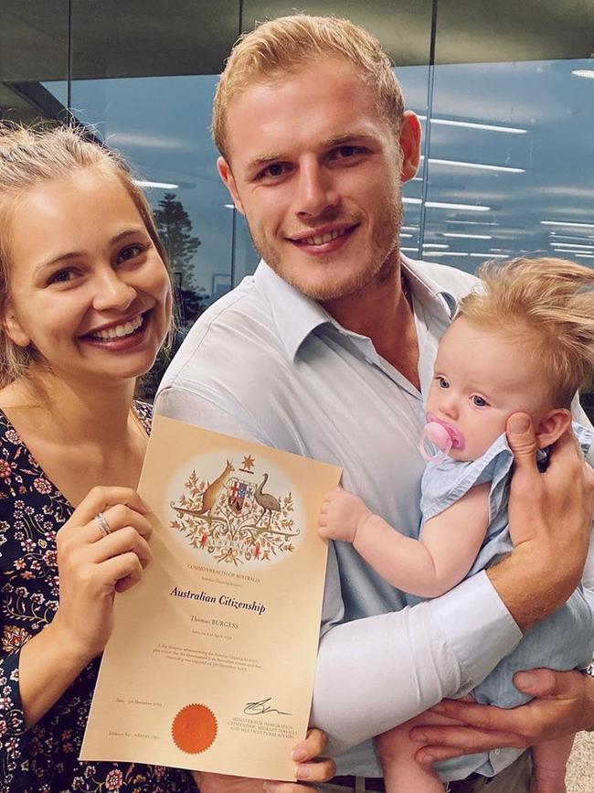 Tom Burgess, his fiancee Tahlia and daughter Sophie on the day he became an Australian citizen.