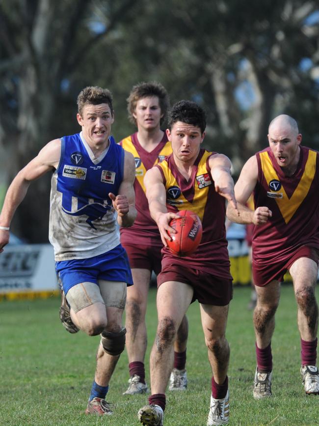 Sam Anson, left, playing for Westerns in the South West District league in 2010 when he also won the league best and fairest.