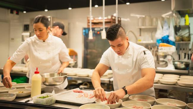 Monica Mignone and Derek Lau in the kitchen at the pop-up dinner at The Hatter and the Hare. Picture: Tommy Kuo, Mind Society Studios