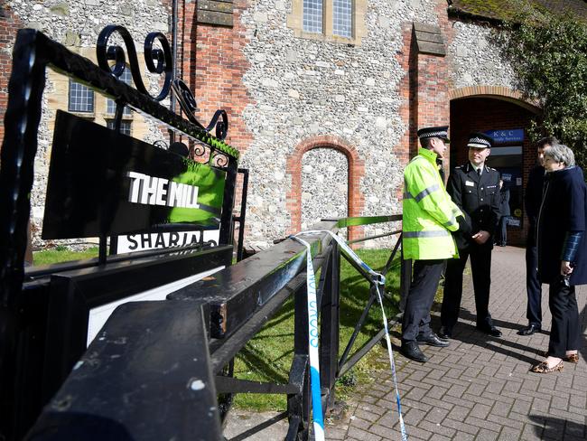 British Prime Minister Theresa May stands outside The Mill pub during a visit to the city where former Russian intelligence officer Sergei Skripal and his daughter Yulia were poisoned. Picture: Getty