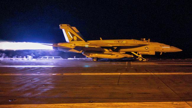 A fighter jet takes off from the carrier USS Dwight D. Eisenhower last week in response to increased Iranian-backed Houthi attacks on ships in the Red Sea.  Picture: Zachary Elmore / US Navy / AFP