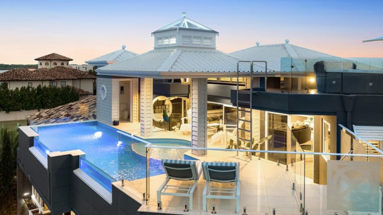A glass-edged pool and entertaining terraces with spectacular views for hosting parties of up to 100 guests
