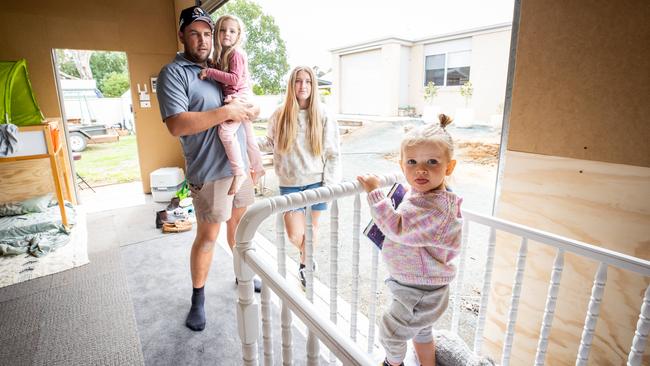 The Windridge family is living in a two-room shed while they wait for their near new home to be repaired. Picture: Jason Edwards