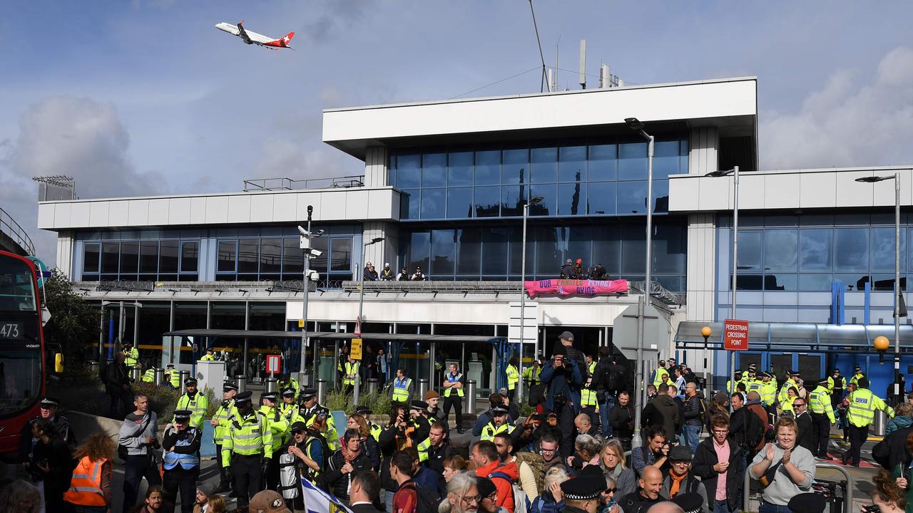 Activists demonstrate outside London City Airport. Picture: Daniel Leal-Olivas/AFP
