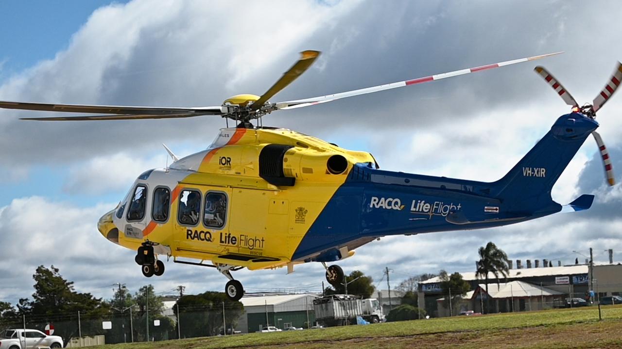 A woman aged in her 20s has been seriously hurt after a car rolled down an embankment and hit a tree on a rural stretch of road south of Maryborough.