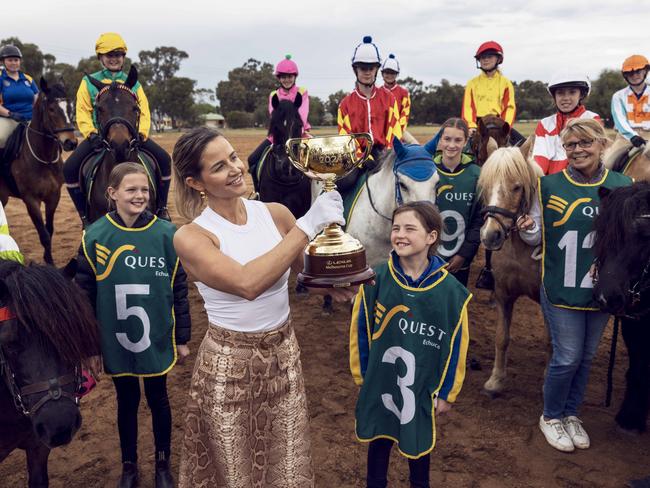 Michelle Payne and Rochester Pony Club with the trophy. Picture: Nicole Cleary