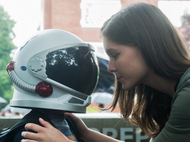 Jacob Tremblay (wearing helmet) and Izabela Vidovic in a scene from film Wonder