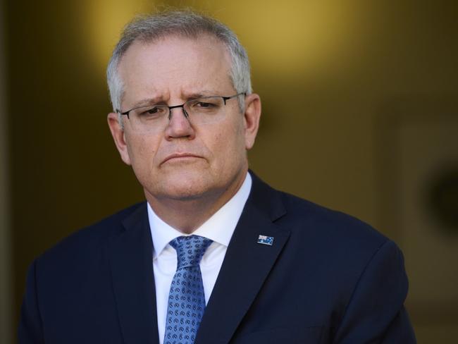 CANBERRA, AUSTRALIA - AUGUST 23: Australian Prime Minister Scott Morrison discusses the Government's plan to 'live with the virus' during a press conference at Parliament House on August 23, 2021 in Canberra, Australia. Federal parliament has resumed in Canberra, despite the ACT being in lockdown due to growing COVID-19 cases. NSW and Victoria are also currently in lockdown as health authorities work to contain the spread of the highly contagious Delta strain of the coronavirus. (Photo by Rohan Thomson/Getty Images)