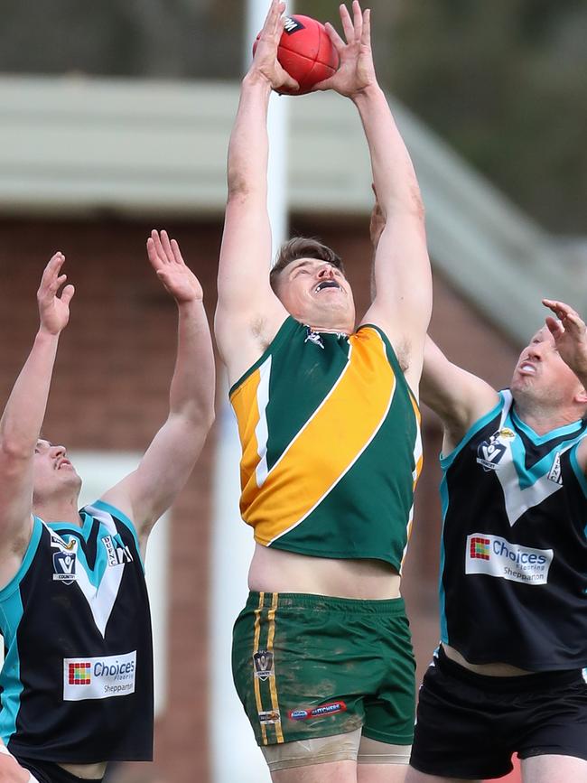 Murchison-Toolamba’s James Lloyd, centre, has brought up 100 goals after booting three in a draw with Shepparton East. Picture: Yuri Kouzmin