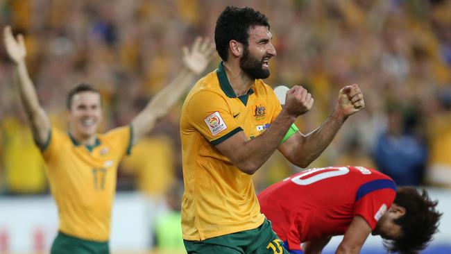 Australia's Mile Jedinak lets out the emotion.