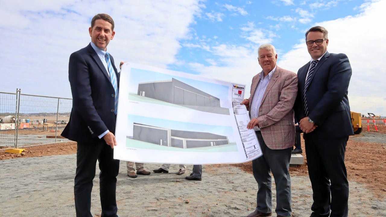 WORK STARTS: State Development Minister Cameron Dick (left) celebrates the start of work on the Qantas Pilot Academy at Wellcamp Airport with Wagner Corporation's John Wagner and academy executive manager Wes Nobelius. Picture: Contributed