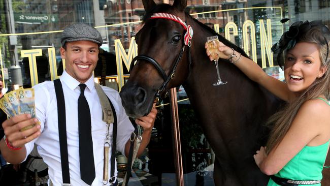 Betting, horses and champagne, the three keys to the Melbourne Cup. Picture: Chris Pavlich