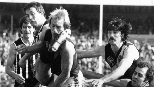 SANFL 1981 Grand Final – Port Adelaide vs. Glenelg Grand Final at Football Park. Glenelg's Graham Cornes got a boot to the face from Magpie David Granger. Picture: Supplied