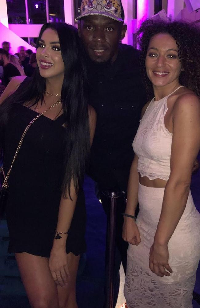 Raquel Petit and Usain Bolt with another club-goer on a night out at a Gold Coast hotspot. There is no suggestion Bolt was aware of Petit’s colourful past or that she is facing charges.