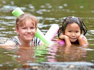 Layla and Araya Lynam having a swim at Cedar Grove. Picture: Renee Pilcher