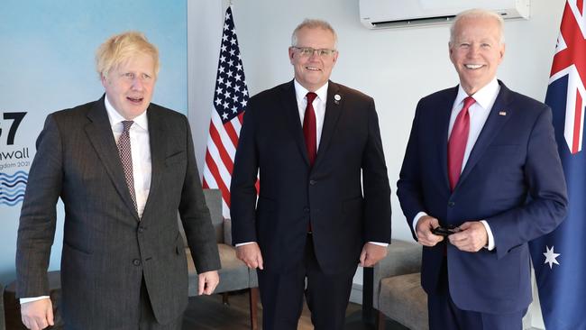 Boris Johnson, Scott Morrison and Joe Biden in Cornwall in June. Picture: Adam Taylor / PMO