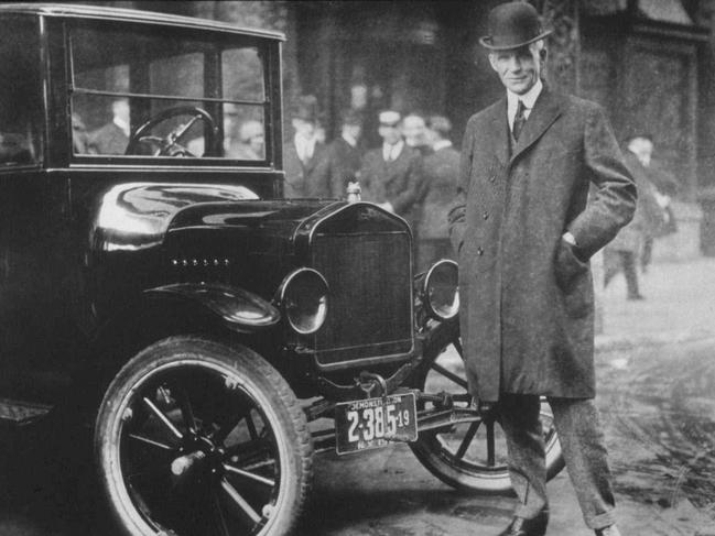 Henry Ford and his Model T.