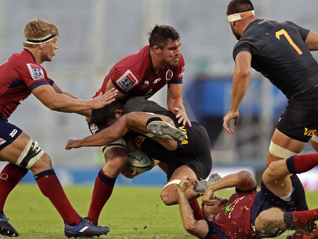 Reds lock Kane Douglas (top-C) vies for the ball with Argentina's Jaguares flanker Pablo Matera.