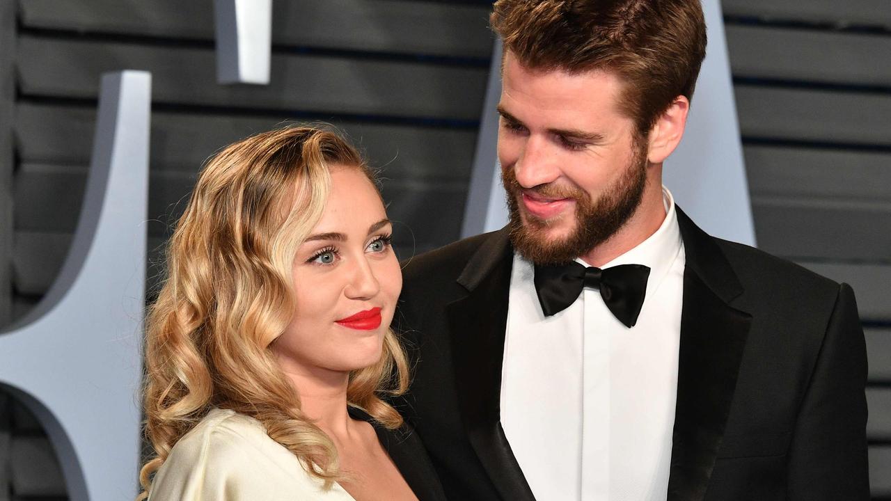 Miley still lives in the home next door to Hemsworth’s fire-gutted former property. Picture: AFP.