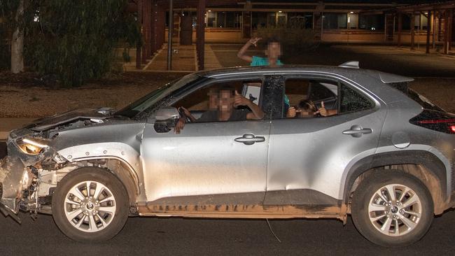 Four youths in an allegedly stolen Toyota Rav 4 take to the streets of Alice Springs before abandoning the damaged SUV. Picture: Liam Mendes