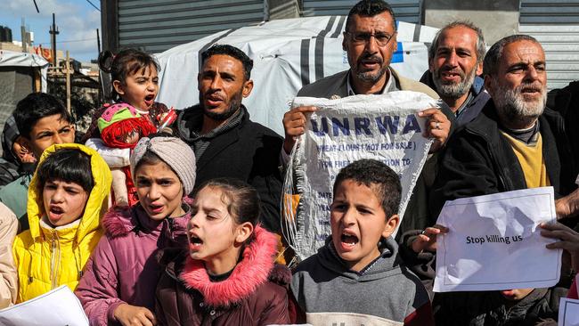 Palestinian men and children gather for a demonstration in Rafah in the southern Gaza Strip on January 30. Picture: AFP