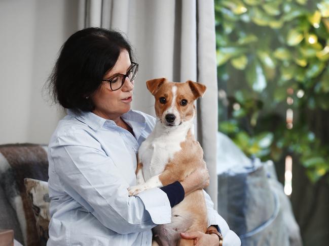 Margie Attard with rescue dog Teddy at her home in Leichhardt. Picture: Sam Ruttyn