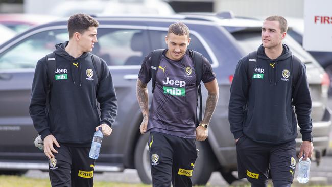 Richmond Players arrive at Melbourne airport to board the plane. Picture: Wayne Taylor.