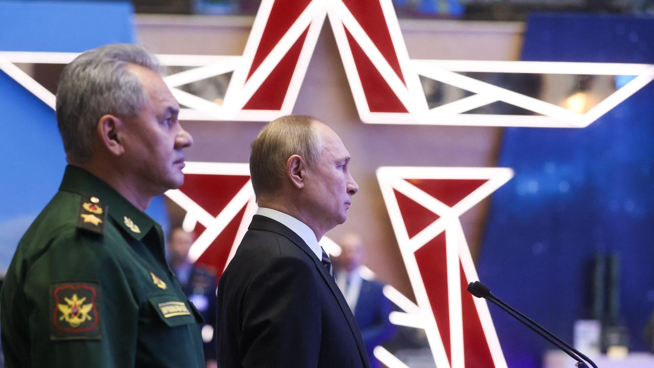 Russian President Vladimir Putin and Defence Minister Sergei Shoigu. Picture: Mikhail Metzel/Sputnik/AFP