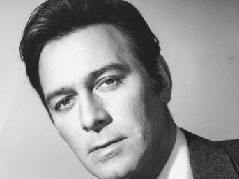 A young Christopher Plummer posing for a studio portrait in the 1950s.