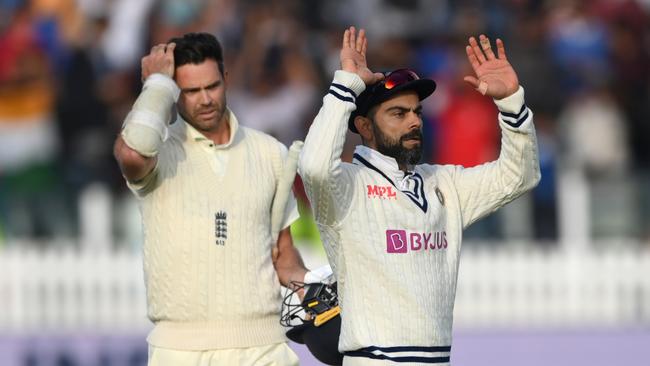 LONDON, ENGLAND – AUGUST 16: India captain Virat Kohli celebrates as James Anderson reacts after day five of the second Test Match between England and India at Lord's Cricket Ground on August 16, 2021 in London, England. (Photo by Stu Forster/Getty Images)