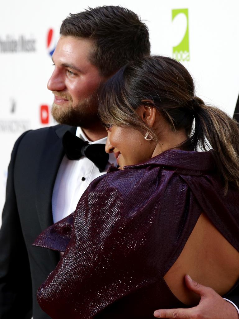 Jessica Mauboy (right) and Themeli Magripilis share a hug on the red carpet. Picture: Jonathan Ng