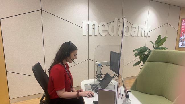 Medibank's Jessica Webb takes customer calls from the health insurer's Geelong store as part of the geofence trial.