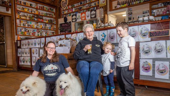 Kate Henning, with her mother Lyn Lawlor-Smith and children Alvin 6, Harriett 3 – with dogs Hoppy And Kent at the Smiling Samoyed Brewery in Myponga, SA. Picture: Ben Clark