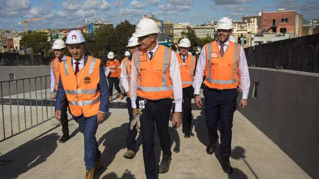 NSW Minister for Transport and Infrastructure Andrew Constance, Sydney Trains Acting Program Director Tom Gellibrand and Laing O'Rourke Managing Director Cathal O'Rourke tour the Sydney Yard Access Bridge after the company was awarded a $955 million contract to transform Central Station.