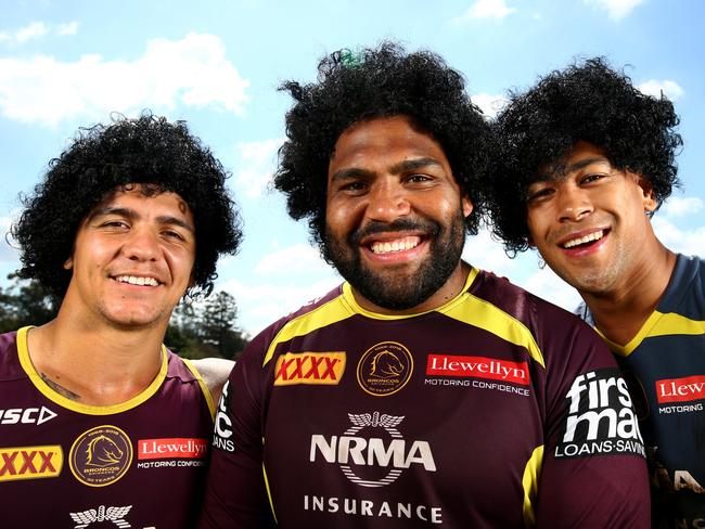 Sam Thaiday (centre) will play his last game at Suncorp Stadium tomorrow, and fans will be able to wear wigs to support him. Teammates Kodi Nikorima (left) and Jamayne Isaako are getting in the spirit already. Picture: Adam Head