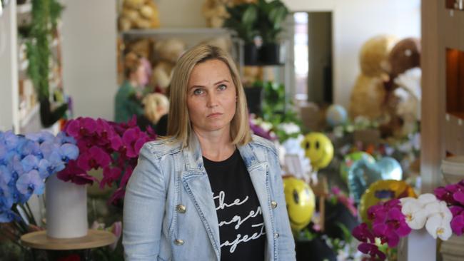 Carli Jeffrey inside Urban Flower on Parramatta Rd. The property and business is being acquired by the NSW Government for the Sydney Metro West project.