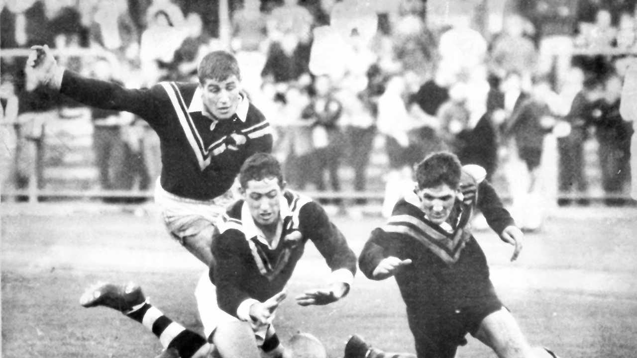 John McDonald (right) plays a rugby league Test match during his playing career. . Picture: Contributed