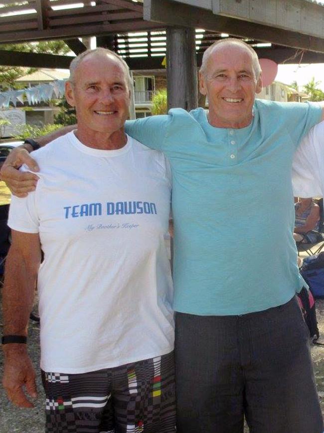 Chris Dawson (left) with twin brother Paul (right).