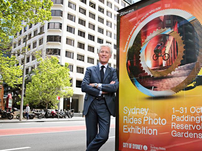 Global Chairman of the Executive Board and Co-CEO of JCDecaux, Jean-Francois Decaux poses next to one of his JCDecaux signs on York st Sydney on the 10th of October 2019. Photographer: Adam Yip