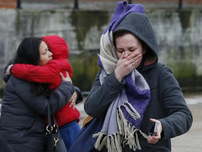 People console each other after another terrorist attack in London. Picture: Getty Images