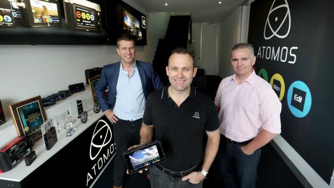 Jeromy Young, centre, with Chris Tait, left, and CFO James Cody in Atomos’s Melbourne office. Picture: David Geraghty