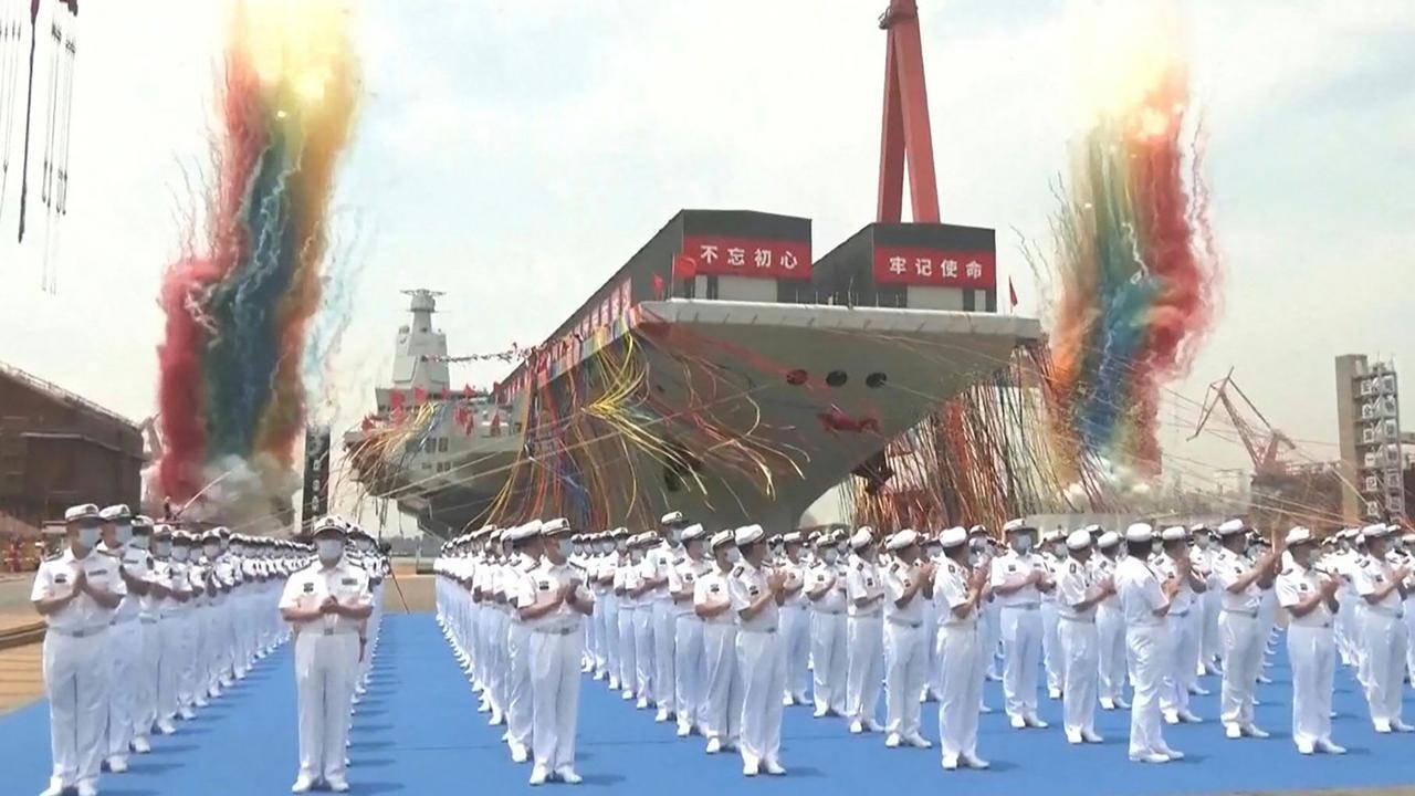 The launch ceremony of the Fujian, a People's Liberation Army (PLA) aircraft carrier, at a shipyard in Shanghai on June 17, 2022. Picture: CCTV / AFP