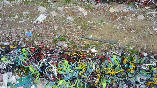 An open space piled up with colourful shared bicycles in Hangzhou. Picture: Getty Images.