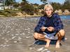 Confronting find as dead fish cover beach