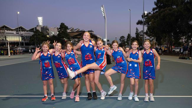 South Barwon Swans under-11 netball team pull their funniest faces.